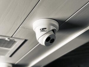 CDS-branded turret security camera installed on ceiling as part of network infrastructure expansion